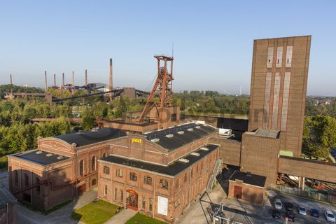 Die 1851 in Betrieb genommene Gründerschachtanlage 1/2/8 ist die älteste Schachtanlage der Zeche Zollverein. Die vorhandenen Ziegelmassivbauten stammen aus dem ersten Jahrzehnt des 20. Jahrhunderts, sämtliche Erweiterungsbauten nach 1932 wurden im architektonischen Stil der Schachtanlage Zollverein XII errichtet. Auf Schacht 1/2/8 befanden sich mit der Markenkontrolle, Kaue und Lampenstube auch die Sozialräume für die auf Schacht 1/2/8 und Schacht XII tätigen Bergleute. Nach der Stilllegung 1986 wurde die Schachtanlage 1/2/8 saniert. In der ehemaligen Maschinenhalle befindet sich heute der Kunstschacht Zollverein, in der einstigen Waschkaue die renommierte Kulturinstitution PACT Zollverein. 2000 wurde die Schachtanlage 1/2/8 in die Denkmalliste der Stadt Essen aufgenommen und gehört seit 2001 zum UNESCO-Welterbe. 

Der Förderturm und das Einstrebenfördergerüst wurden über den beiden ersten Zollverein-Schächten errichtet. 1904 und 1954 wurde die Schachtanlage modernisiert, auch die Förderanlagen wurden dabei erneuert.

Das Fördermaschinenhaus [B44] wurde 1903 erbaut und von 1956 bis 1958 erweitert. In dem Gebäude befand sich die Fördermaschine von Schacht 1/2/8. Heute gehört das Fördermaschinenhaus zum Denkmalpfad ZOLLVEREIN®.

Als Dreh- und Angelpunkt für zeitgenössische Tanz- und Performancekunst ist PACT Zollverein (Performing Arts Choreographisches Zentrum NRW Tanzlandschaft Ruhr) Initiator, Motor und Bühne zugleich. Wo heute internationale Künstler auftreten, wuschen sich von 1906 bis 1986 täglich Tausende von Bergleuten nach der Schicht den Kohlenstaub ab. Im Jahr 2000 wurde das denkmalgeschützte Gebäude der ehemaligen Waschkaue [B45] von dem Architekten Christoph Mäckler saniert und für die Nutzung durch den neuen Eigentümer PACT Zollverein behutsam umgebaut.

Auf dem ehemaligen Materiallagerplatz der Schachtanlage 1/2/8 wird ab 2015 ein Neubau für die Folkwang Universität der Künste für den Fachbereich Gestaltung errichtet.

Areal B [Schacht 1/2/8]